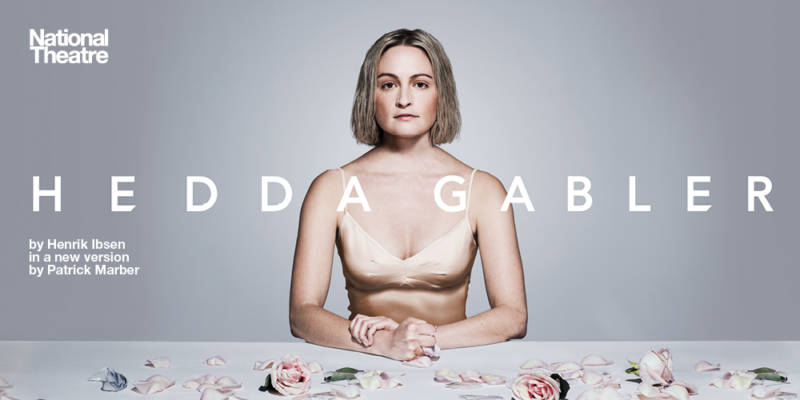 Hedda Gabler, a young woman with short blonde hair stares in to the camera
